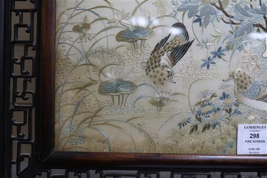 A Chinese hardwood framed fire screen, Emb. panel H.52cm,W.41cm